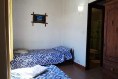 Habitación con dos camas simples